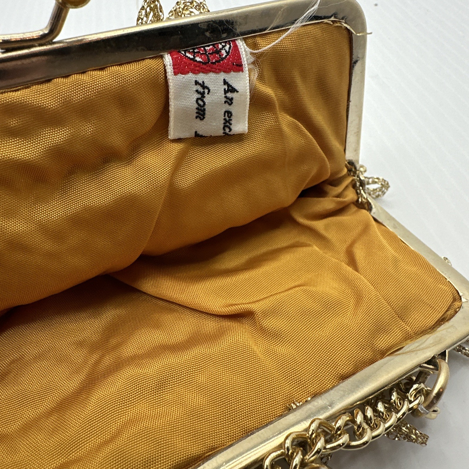 An exclusive import from Italy gold Tone purse R.N. 2906 vintage chain NWT