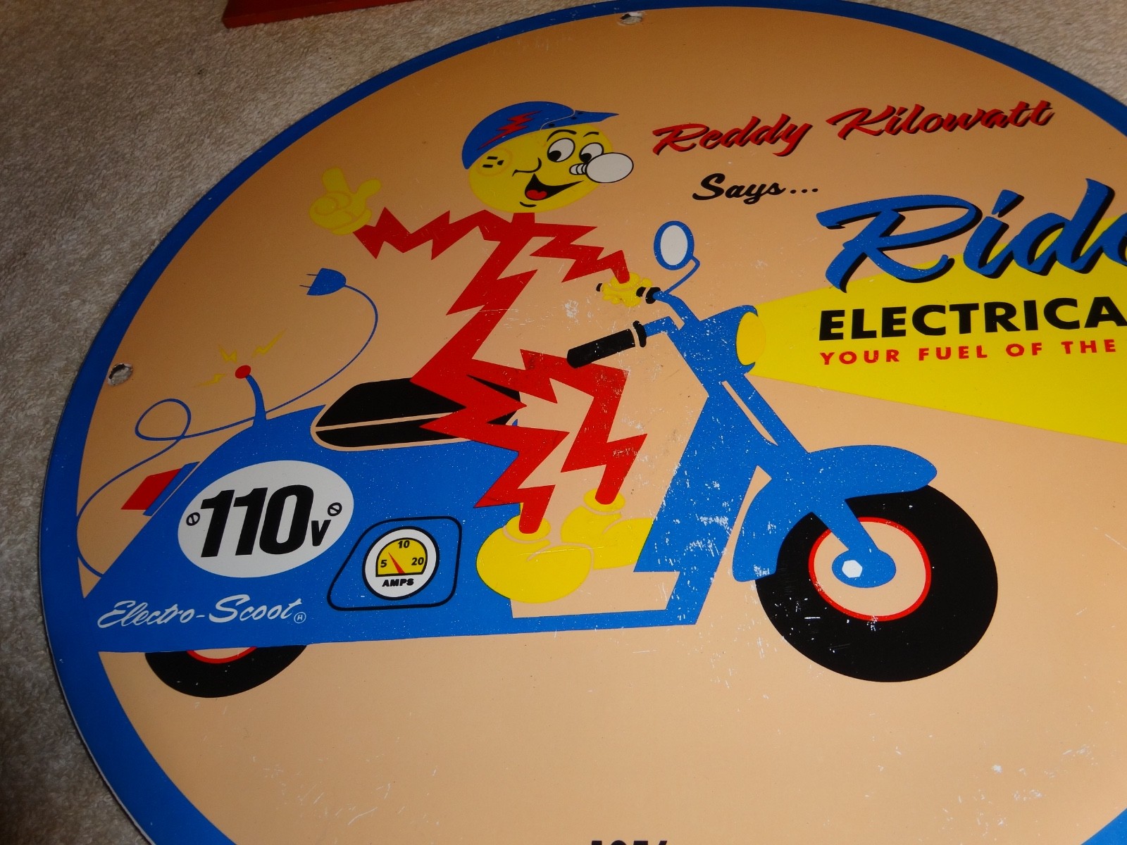 VINTAGE 56 REDDY KILOWATT ELECTRIC SCOOTER 11 3/4" PORCELAIN METAL GASOLINE SIGN