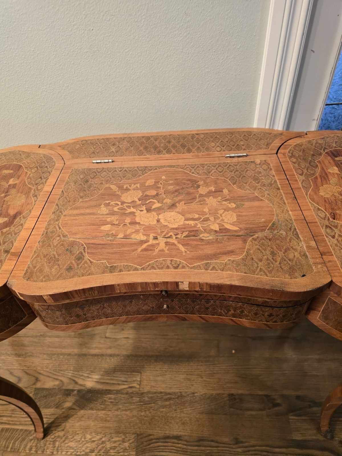 "Antique vanity table from the late 1800s with intricate inlay & a hidden mirror