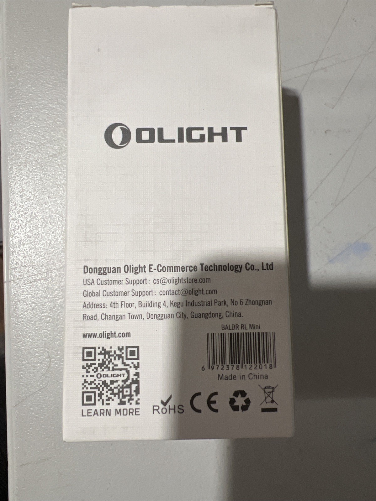 Olight Baldr RL Mini 600 Lumen Tactical Light - Black - Red Beam Laser