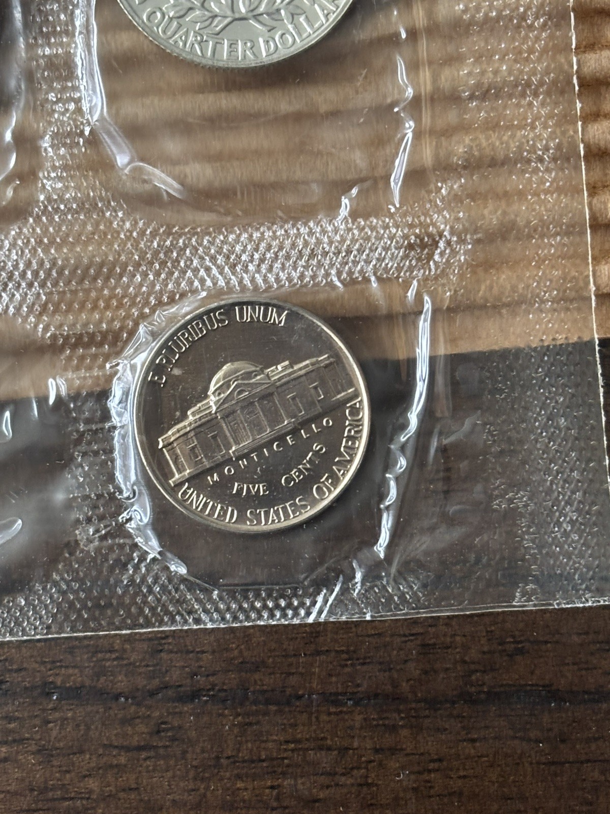 1957 U.S. PROOF SET. Coins U.S. Mint Sealed in a flat cello. (Tear in envelope)