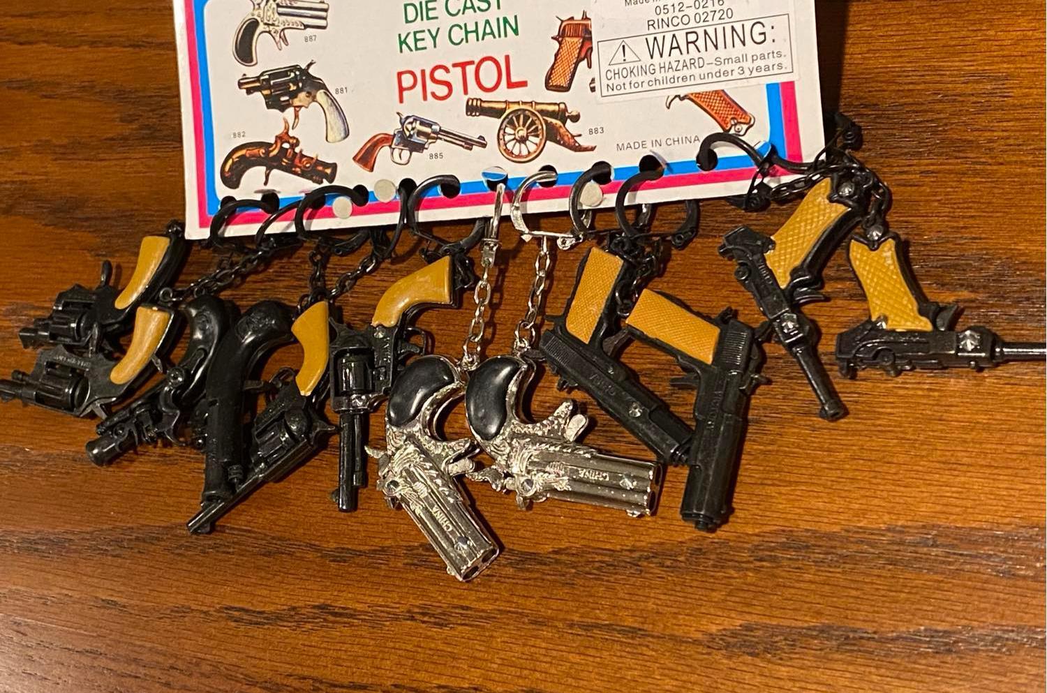 12 Vintage 80's mini key chain diecast metal pistol cap gun - die cast display