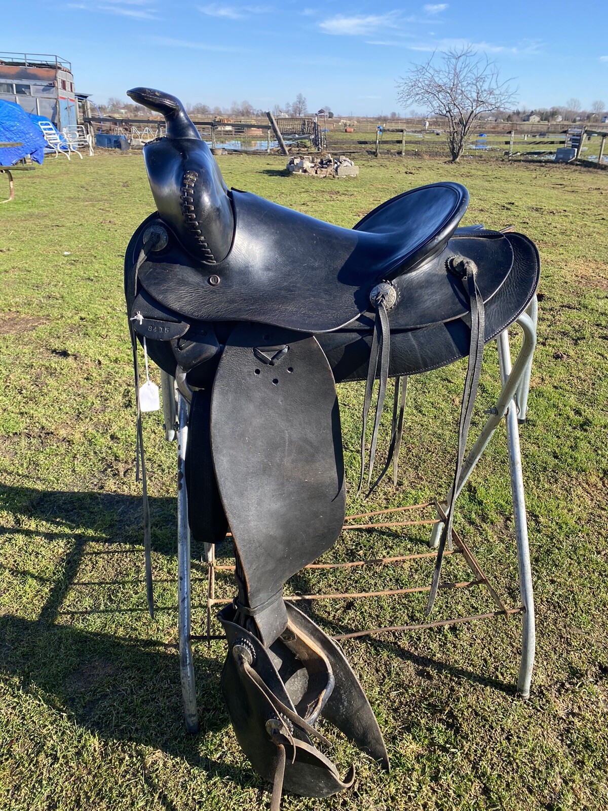 Antique/Vintage J. C.  Higgins 15.5” slick seat Western saddle w/tapaderos