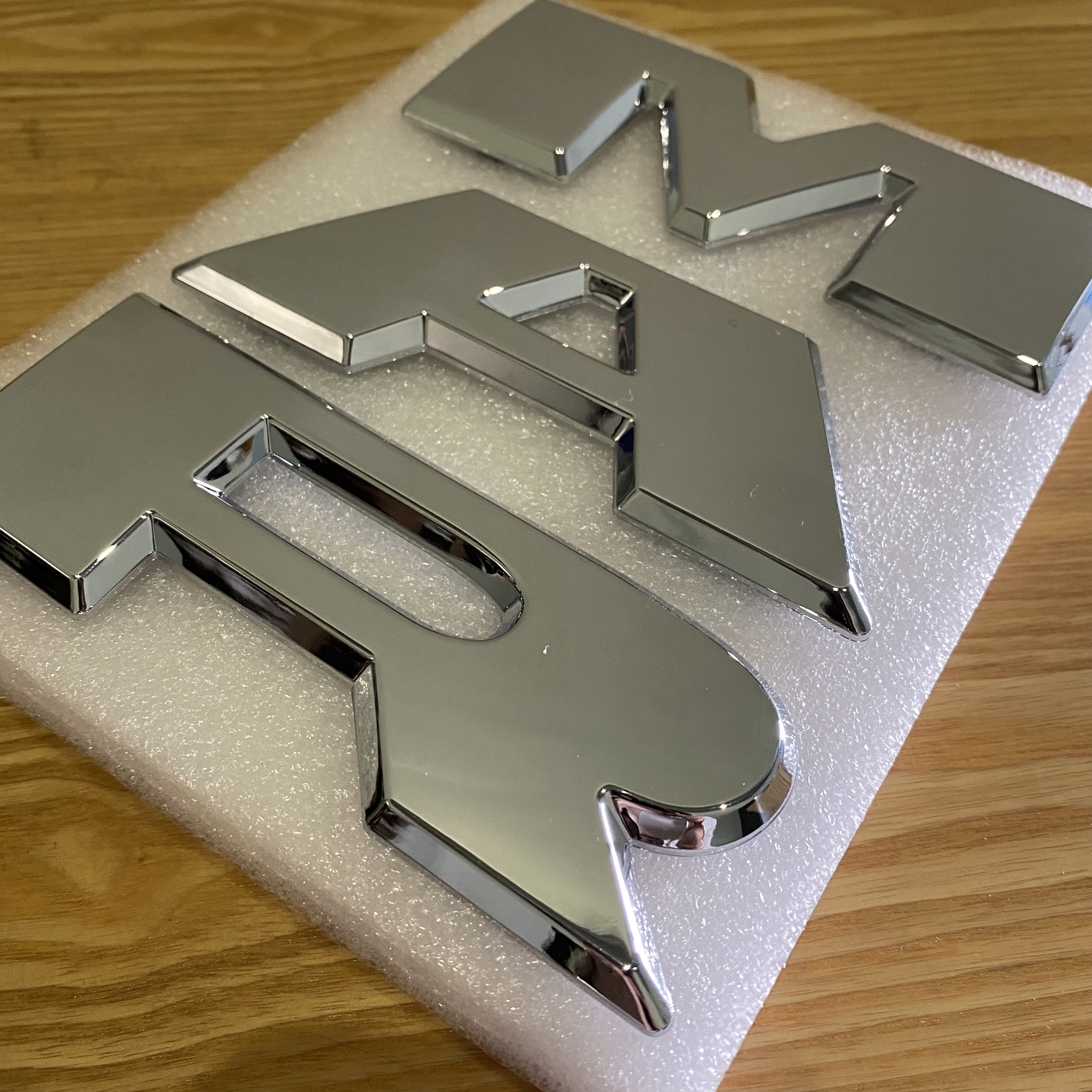 Front Grilles Emblem Letter For 2019-2023 RAM 1500 Grill Badge Chrome 68311411AA