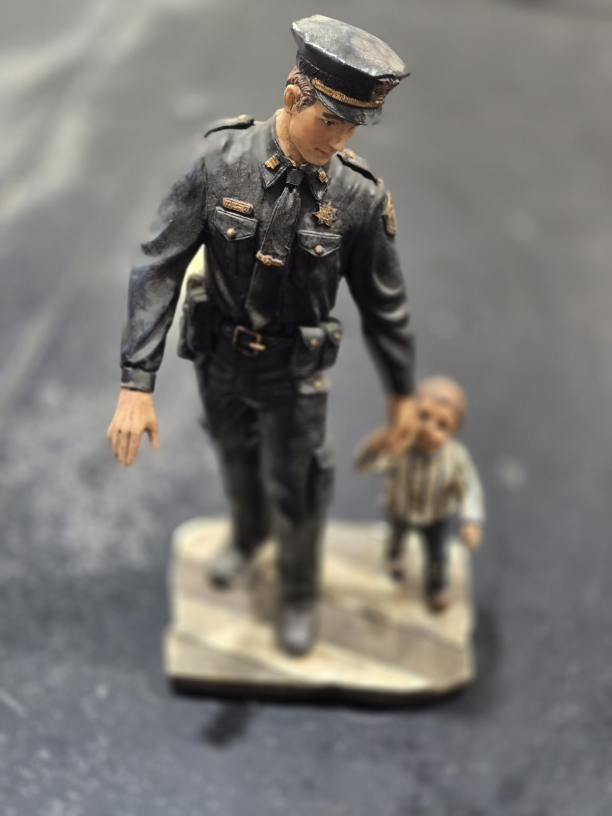 Police Oficer and Child in Crosswalk Statue. 10.5" X 5.75".