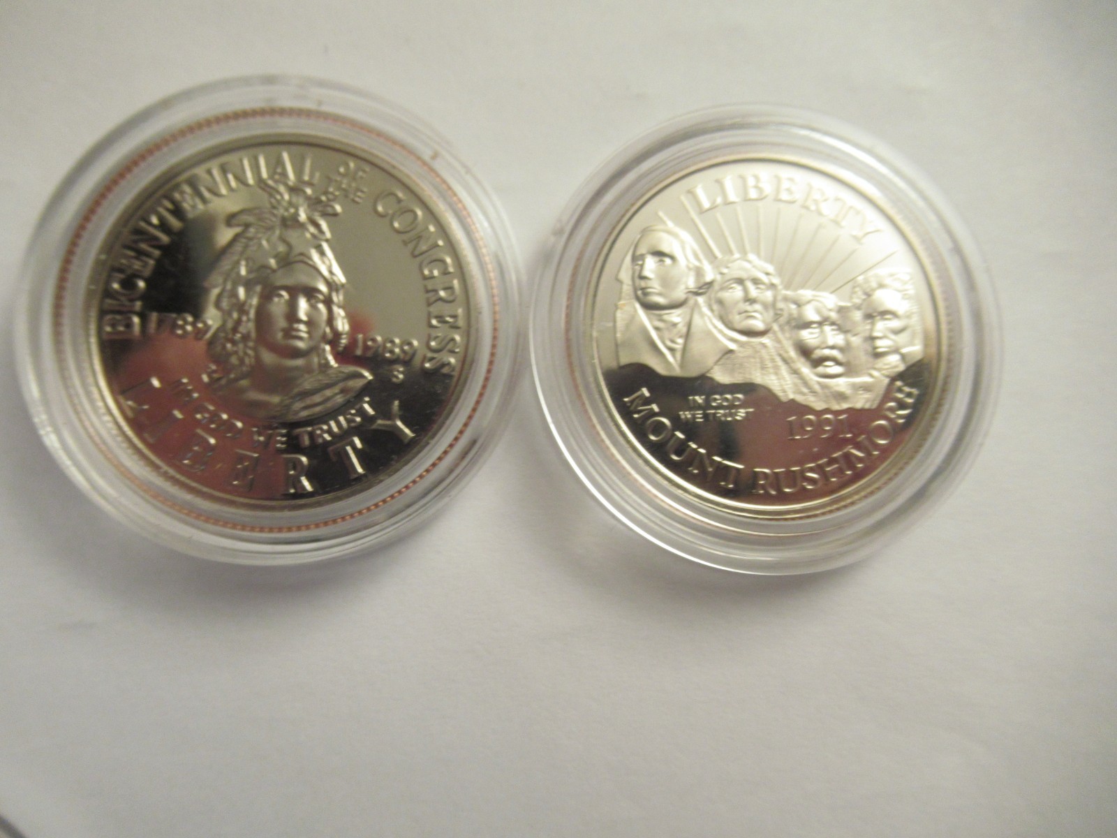 Lot of 11 US Clad half dollars, mix dates, w/ capsules