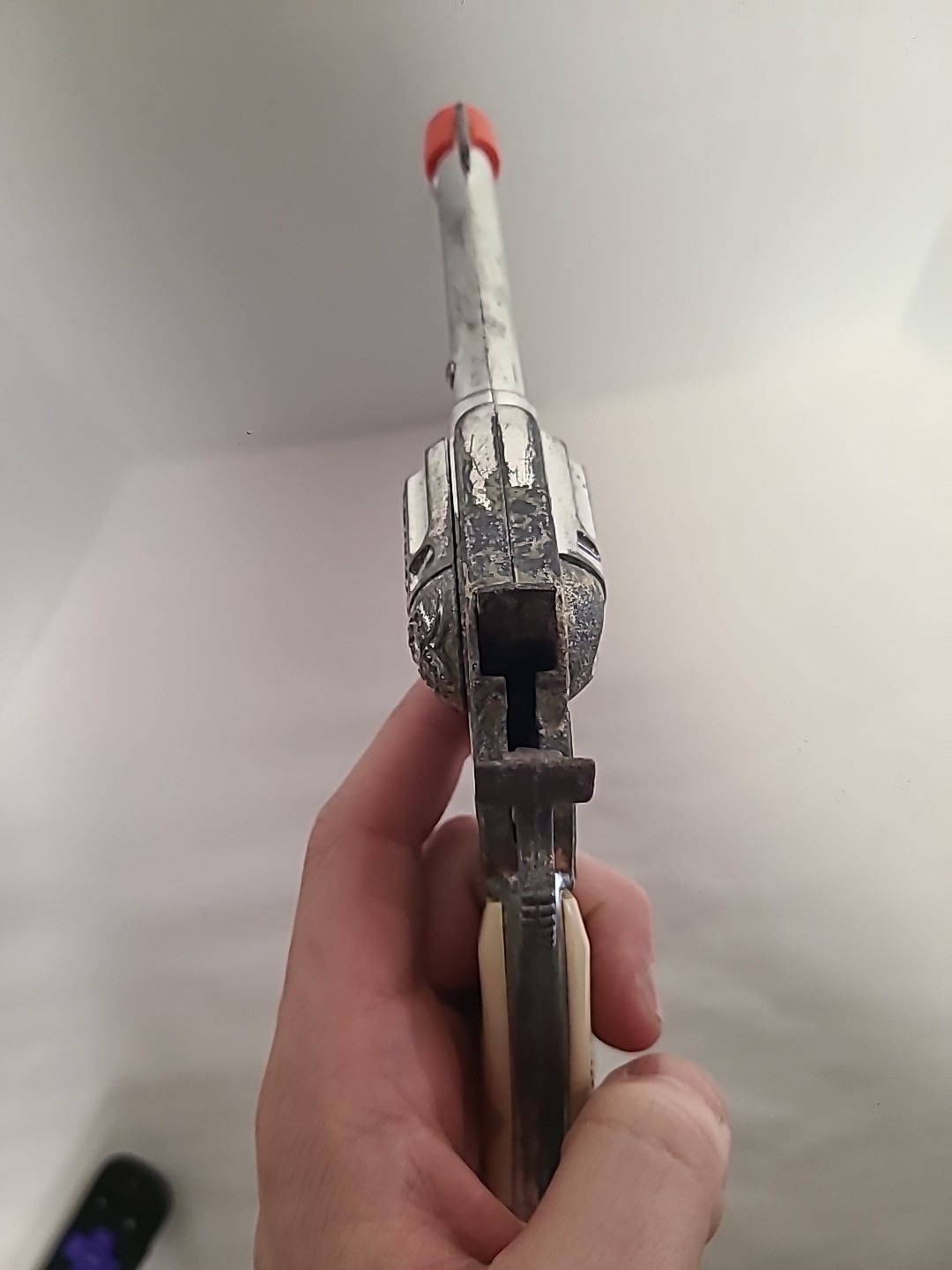 Vintage Halco Cowboy Die Cast Toy Cap Gun with Orange Plug & White Grip Handle—