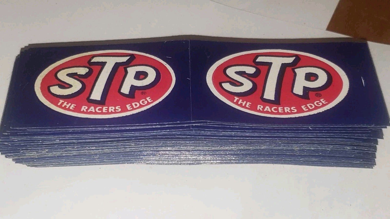(2) Vintage STP “The Racer’s Edge” Paper-Backed Stickers - Small 1.5 X 2.25
