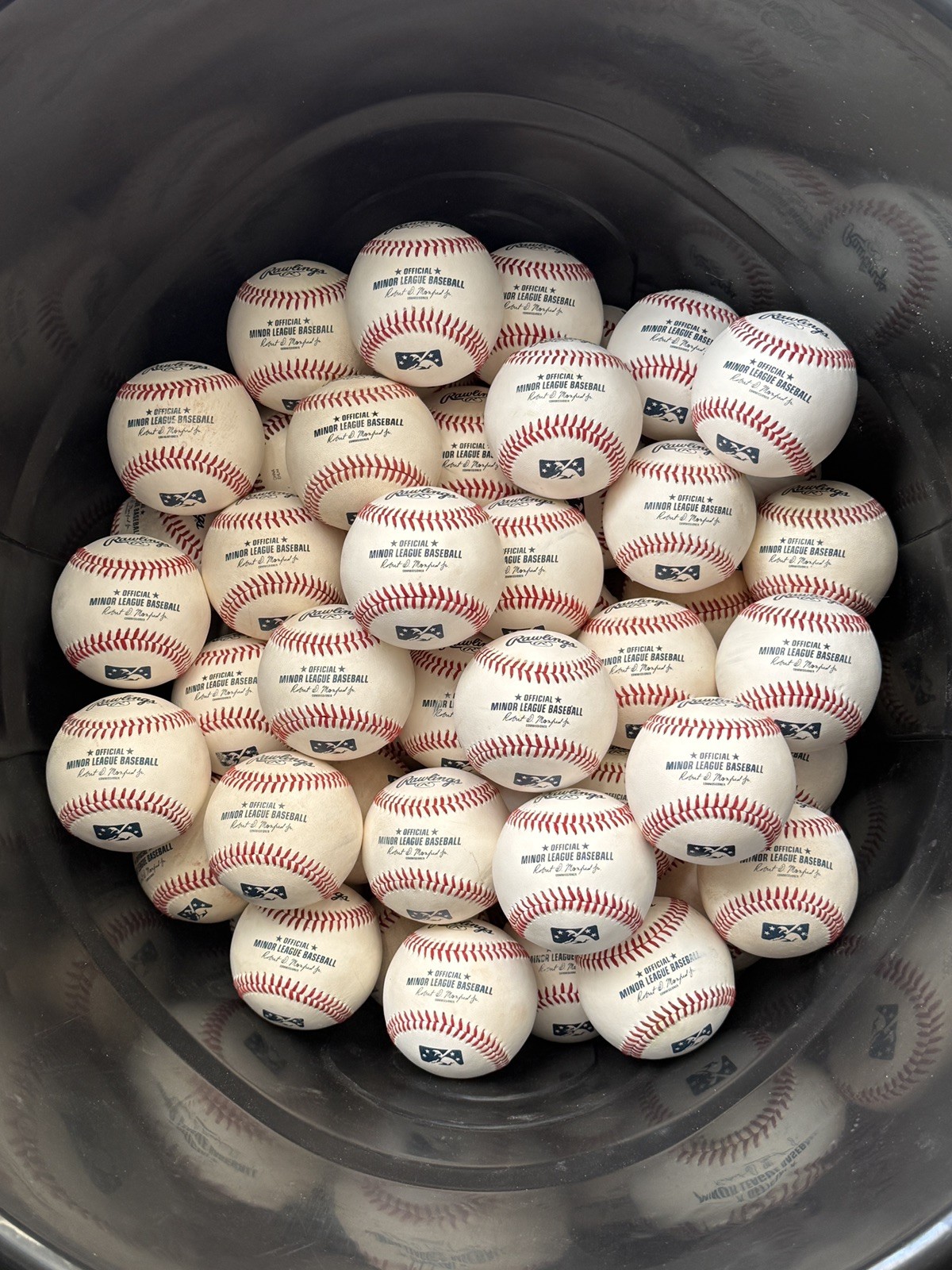 One dozen game Used Rawlings Official Minor League Baseballs
