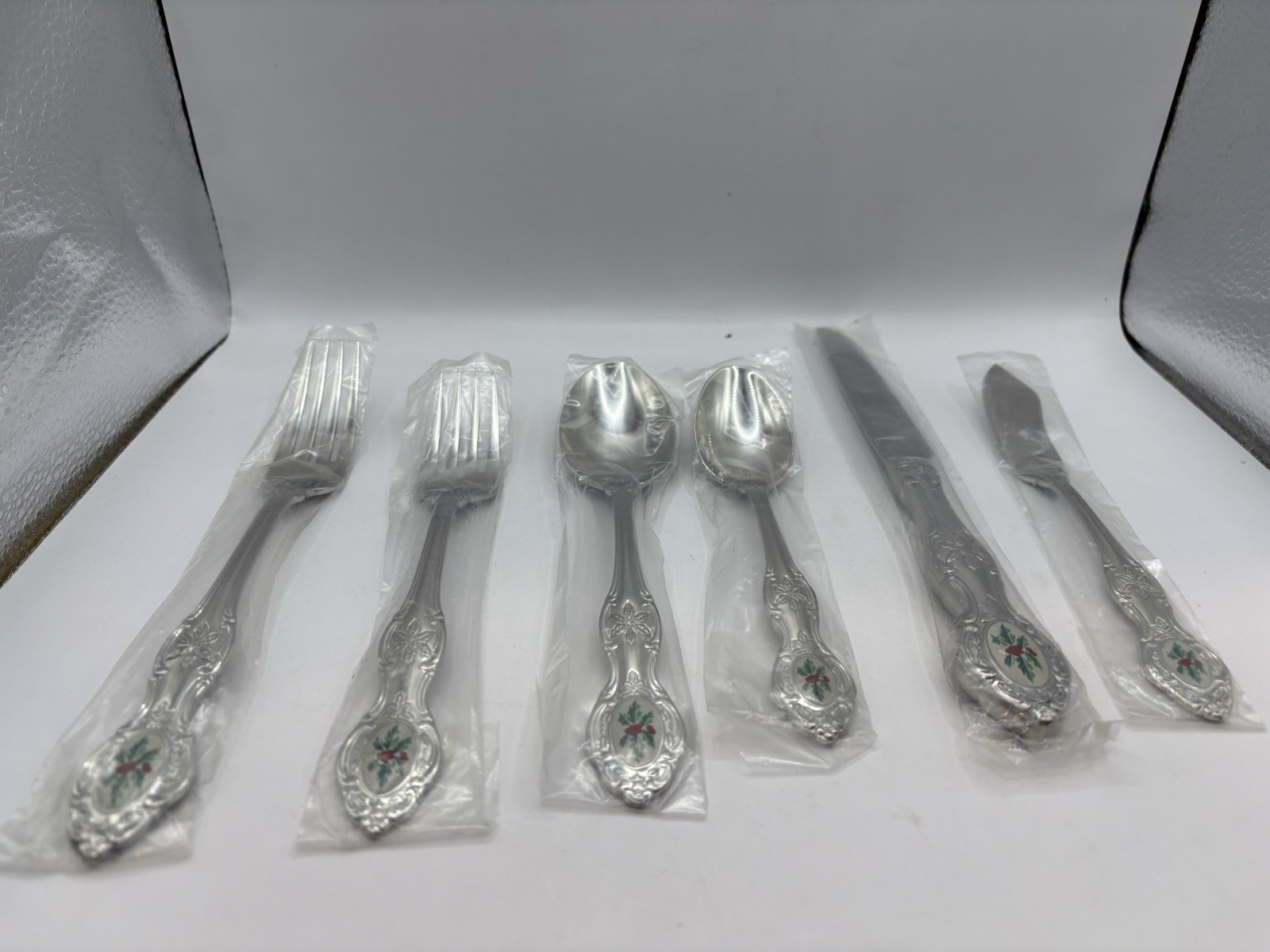 Longaberger  very rare holly flatware Set Of 6