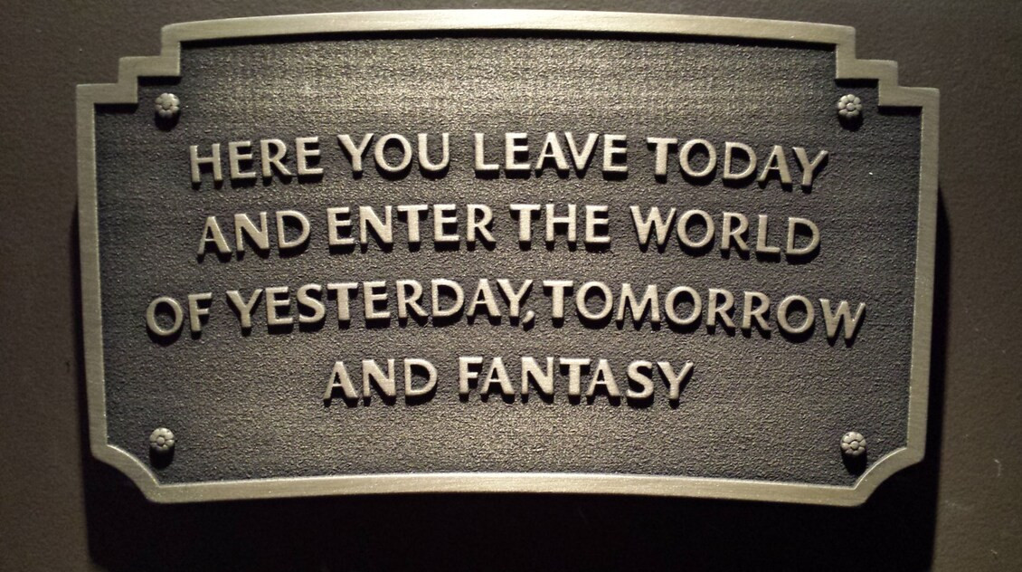 Disneyland entranceway sign plaque