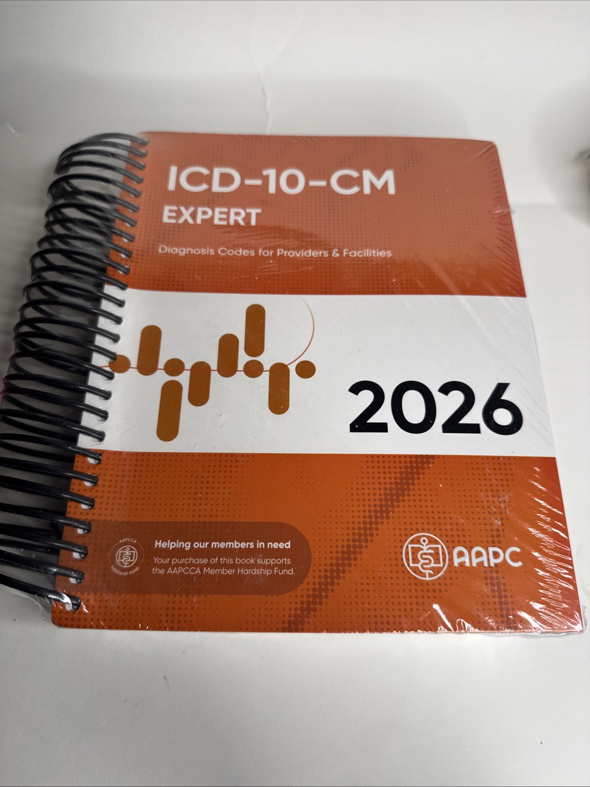 ICD-10-CM Expert Code Book 2026 by AAPC Spiral-bound BRAND NEW