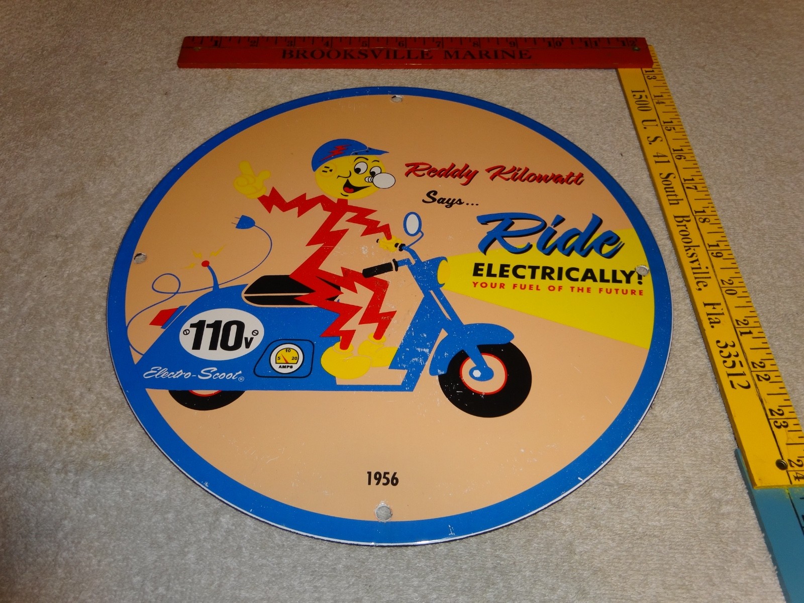 VINTAGE 56 REDDY KILOWATT ELECTRIC SCOOTER 11 3/4" PORCELAIN METAL GASOLINE SIGN