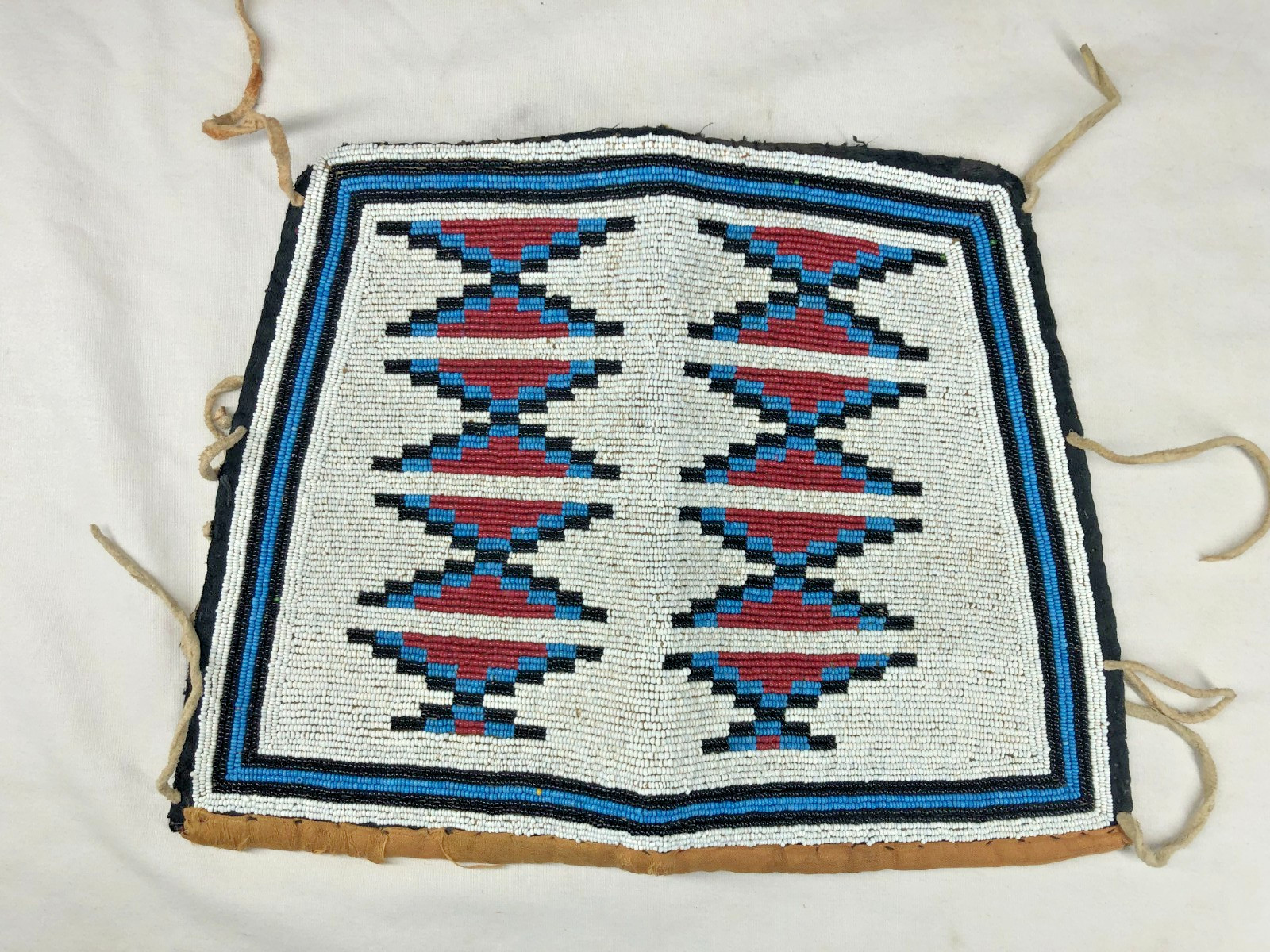 LATE 1800'S/EARLY 1900'S NATIVE AMERICAN MADE BEADED WRIST CUFFS W/ TRADE CLOTH