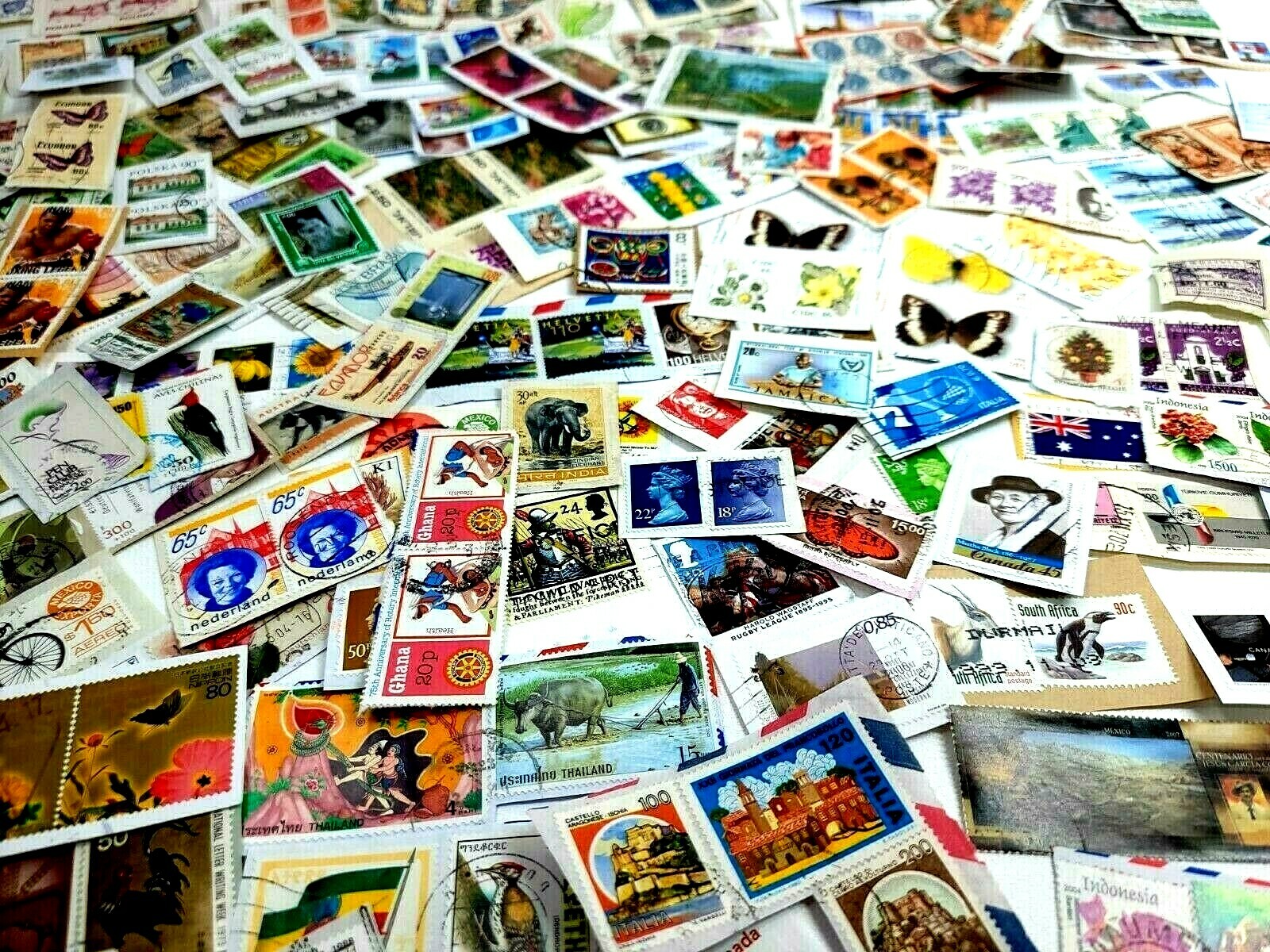 QUARTER POUND of FOREIGN Stamp KILOWARE Mix ON Paper