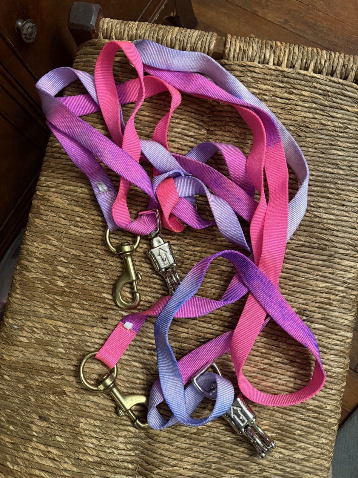 Pair of bright tye dye nylon horse cross ties with panic release snap