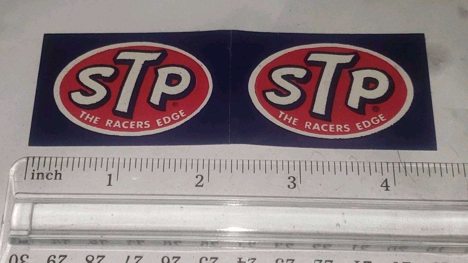 (2) Vintage STP “The Racer’s Edge” Paper-Backed Stickers - Small 1.5 X 2.25