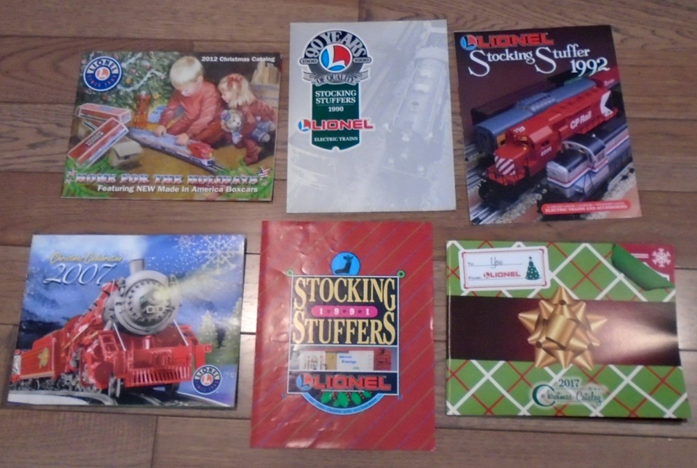 SIX  DIFFERENT LIONEL CHRISTMAS & STOCKING STUFFER CATALOGS (LISTED BELOW)