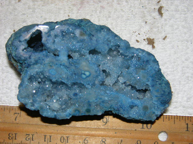 Geode cut & polished half with colored crystal center 4 inch E79