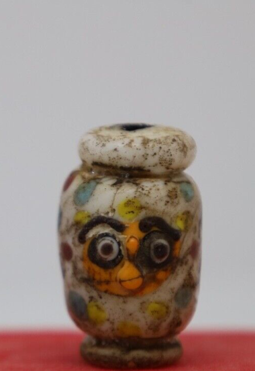 Ancient roman face bead