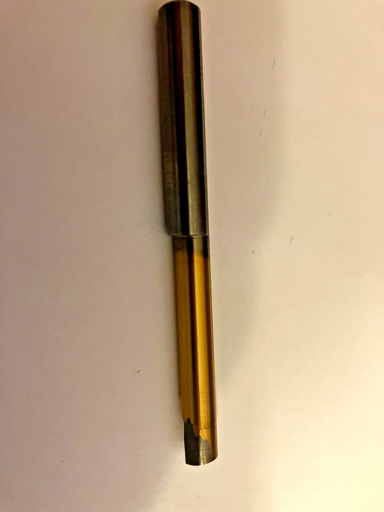 Used Solid Carbide Boring Bar. 3/8" shank . Has been ground off back side a bit