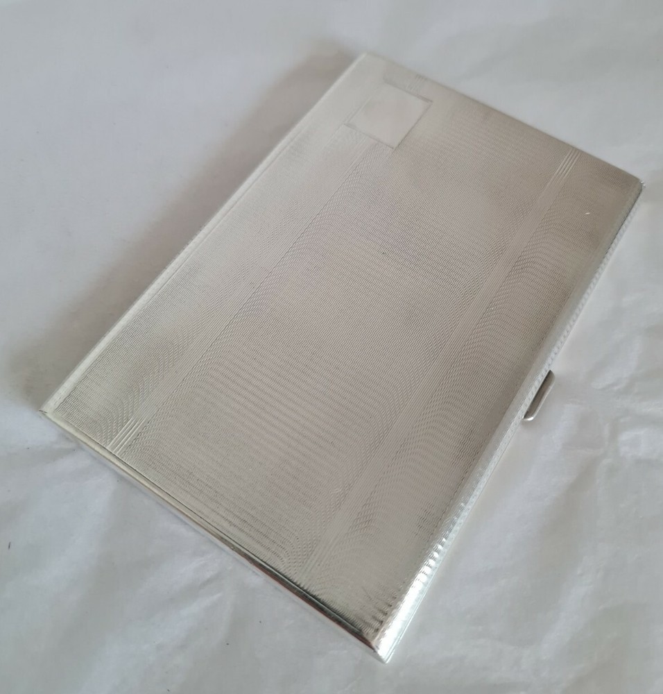 Antique sterling silver cigarette case. Engine turned decoration.Birmingham 1939