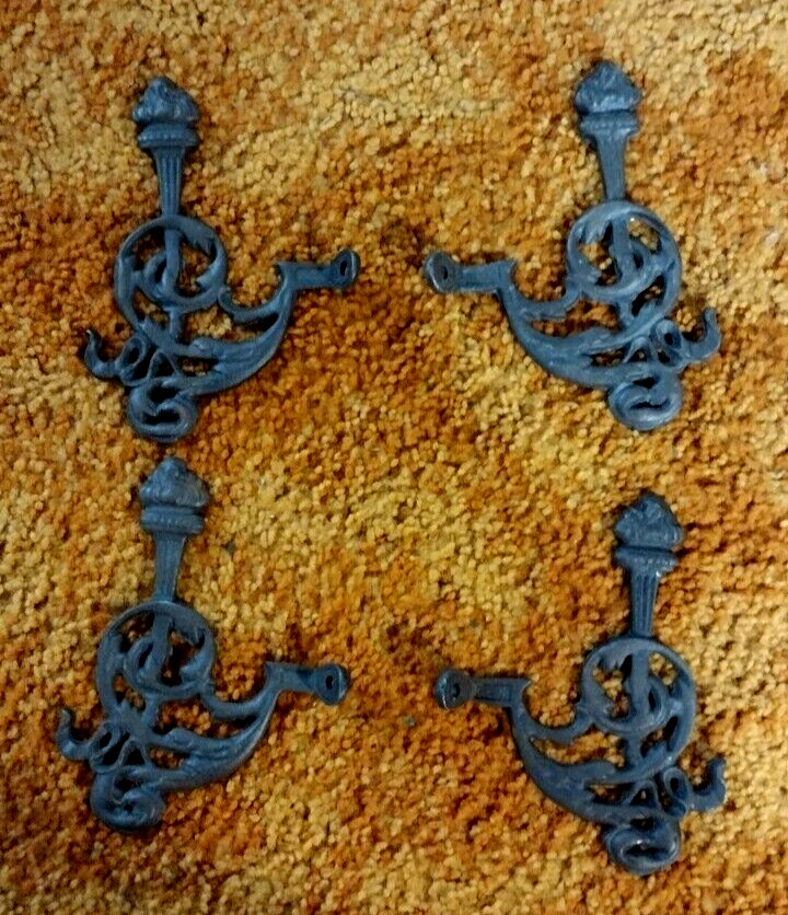 ANTIQUE CAST IRON (4) COAT TREE HOOKS WITH TORCHES ORNATE