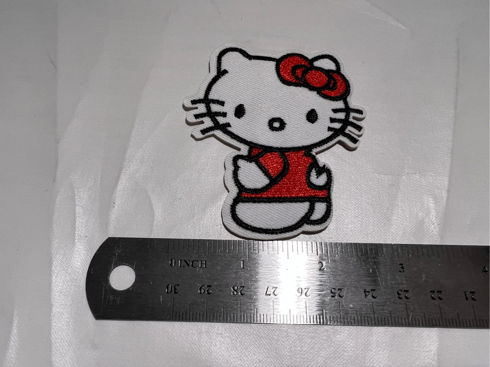Hello Kitty Looking Over Shoulder Iron on Patch