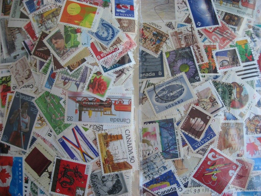 Canada colossal mixture (duplicates,mixed cond) 2000 old,new,35%comems,65%defins