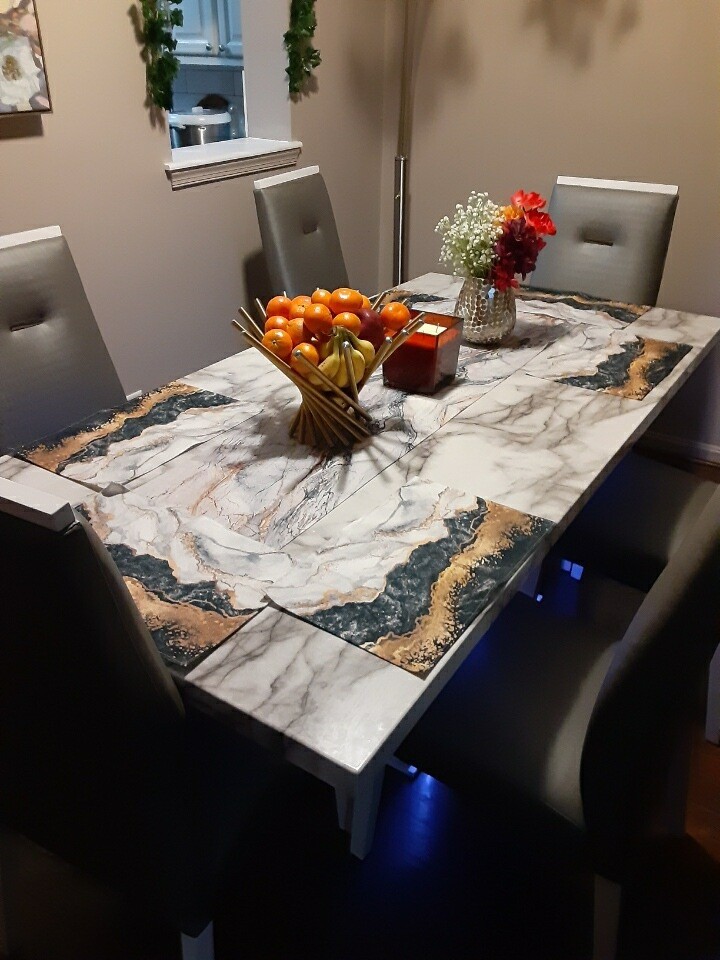 Marble Dining Table with 6 Gray Chairs and Beautiful Buffer with LED lights.