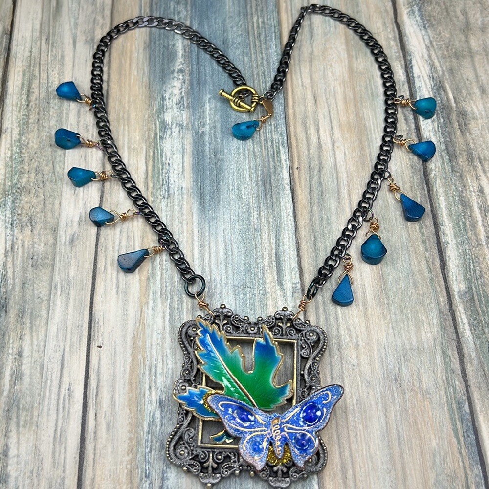 Adorned Crown Artisan Assemblage enamel blue framed butterfly leaf necklace