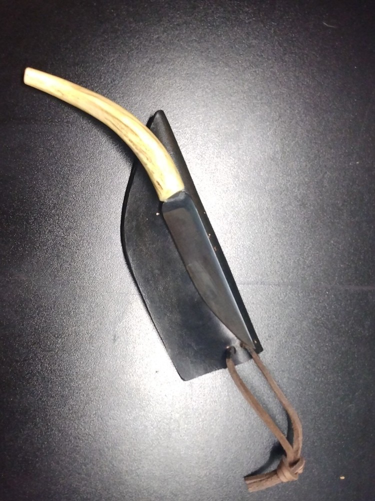 Unique handmade 8" knife in leather sheath