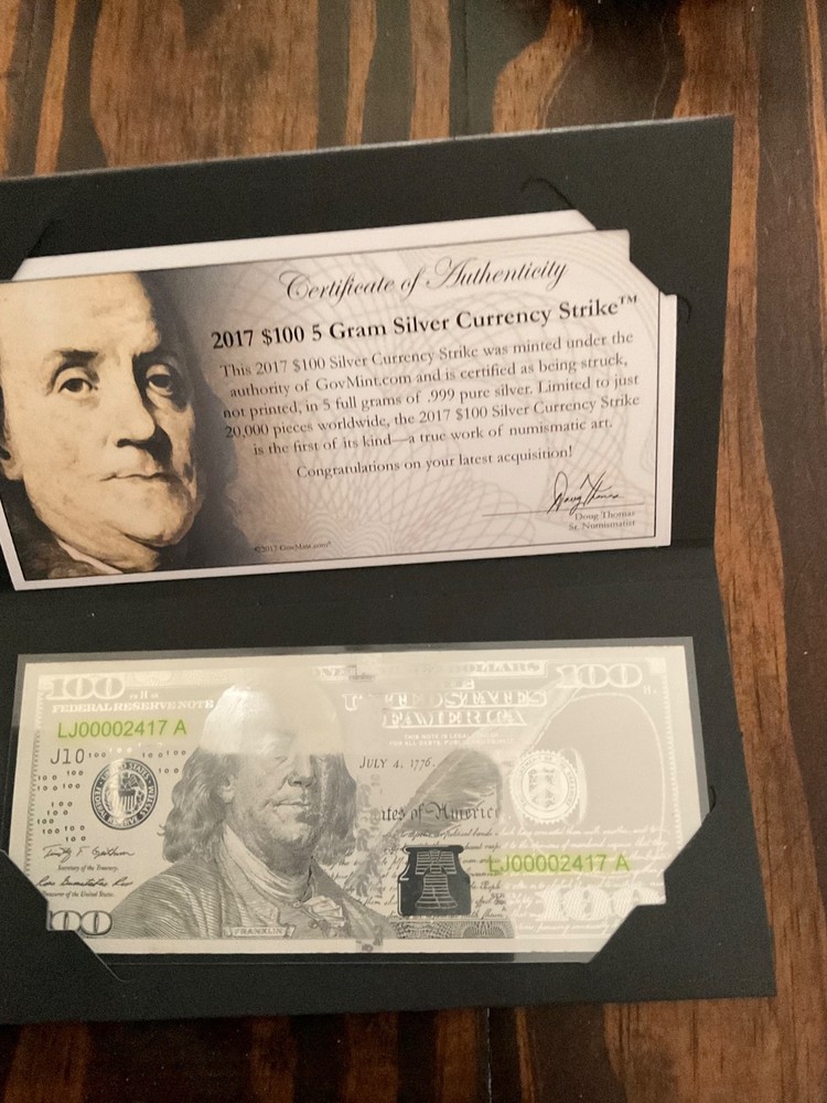 2017 $100.00 5 gram currency strike with pen.