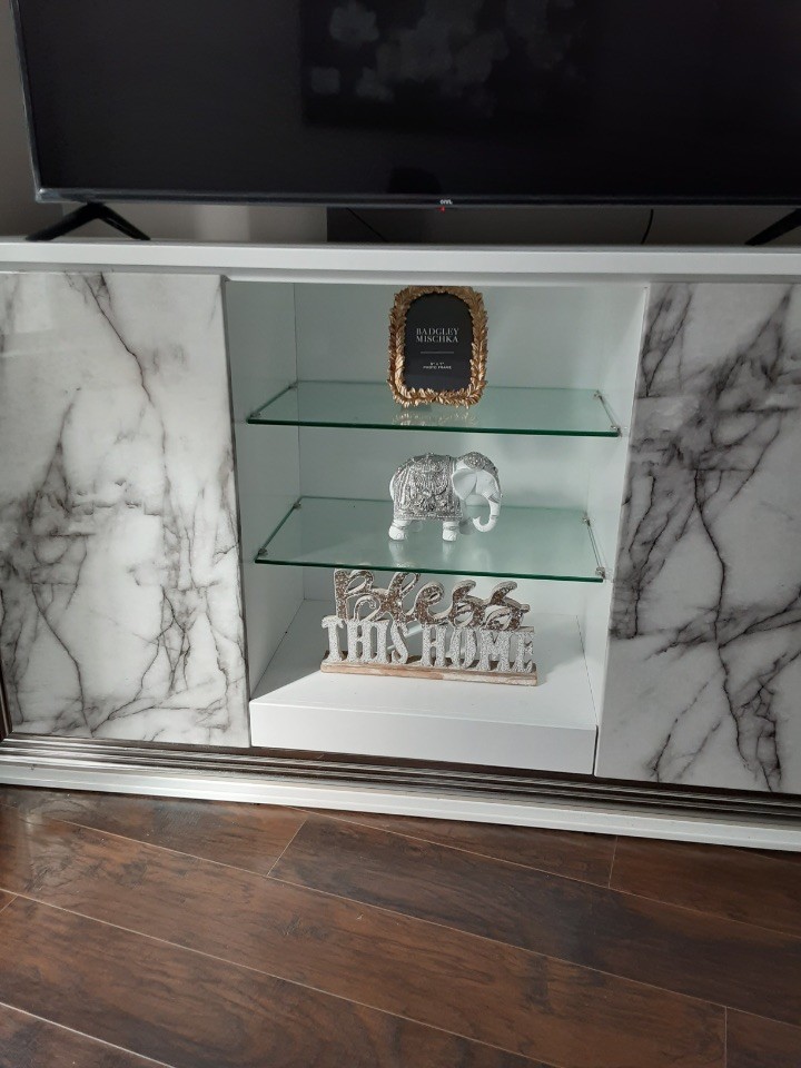 Marble Dining Table with 6 Gray Chairs and Beautiful Buffer with LED lights.