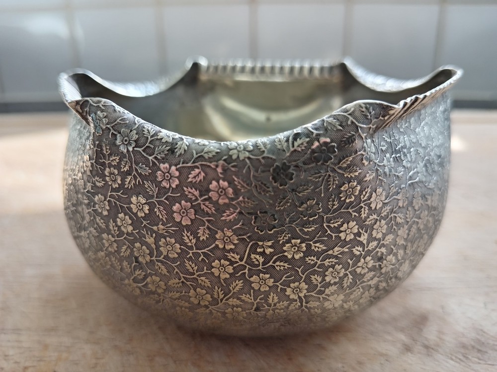 Silver plated very ornate rose bowl.