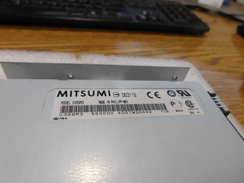 Mitsumi Model: D359M3 Floppy Disk Driveee with Tray.
