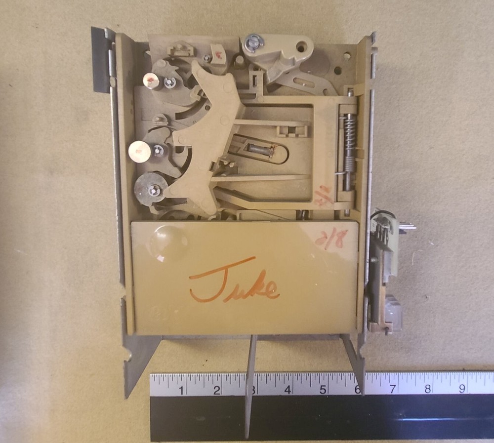 Coinco coin acceptor with jukebox bracket  - untested