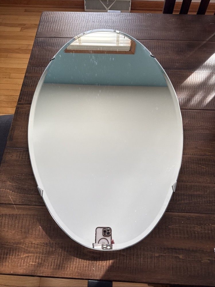 Frameless Oval Shaped Beveled Mirror 31.5" X 19.5"