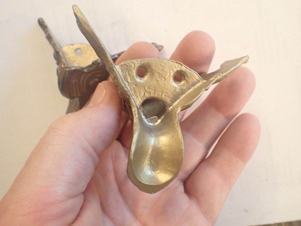 TWO FRONT FEET FOR BLACK MANTEL CLOCK