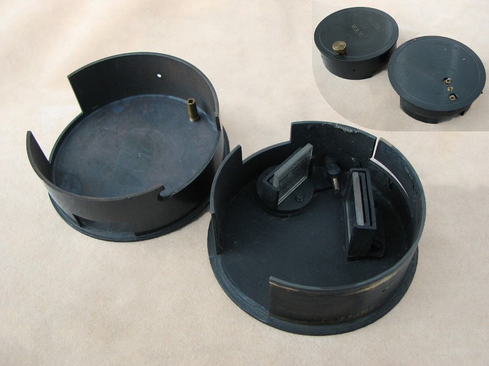 Antique Norton & Gregory large optical square in leather case.