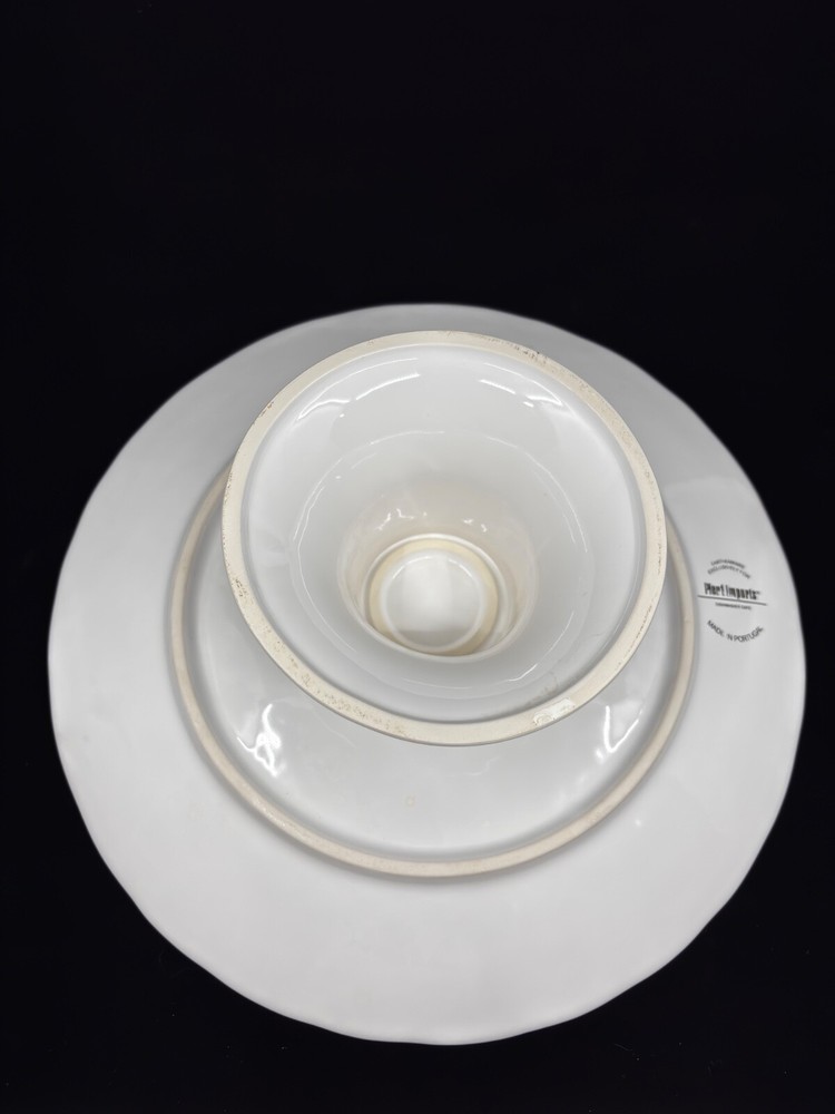 Large Pier 1 cake stand white with a floral pattern