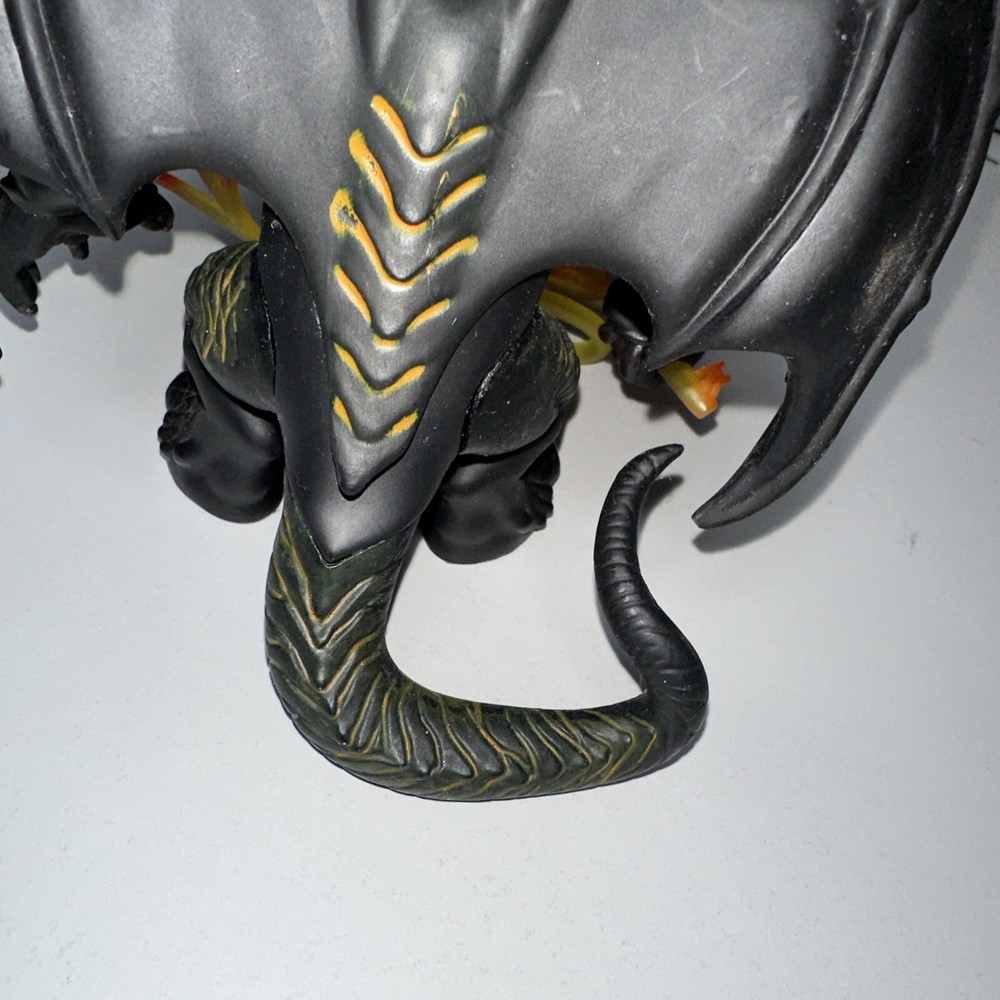 bobblehead demon with fire rope