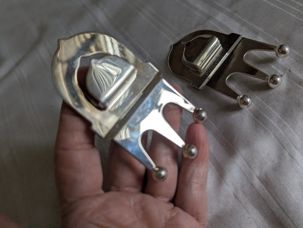 Neiman Marcus pair silver plated crown bottle openers
