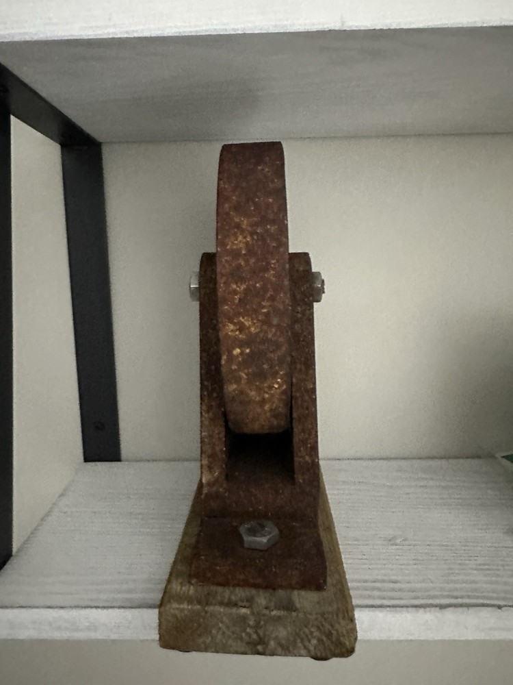 metal wheal on Wooden Base