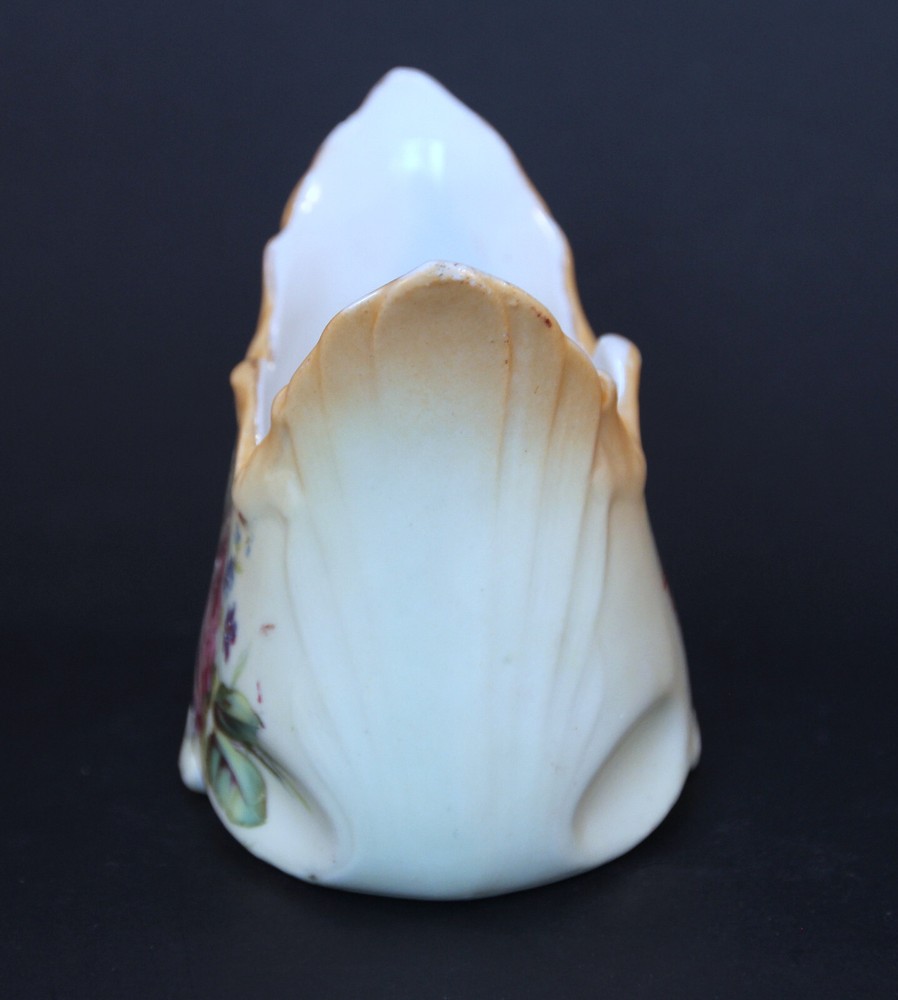 Vintage flared open sugar container with flowers on front. Unique shape