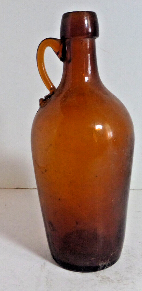 brown glass bottle applied handle antique EMPTY