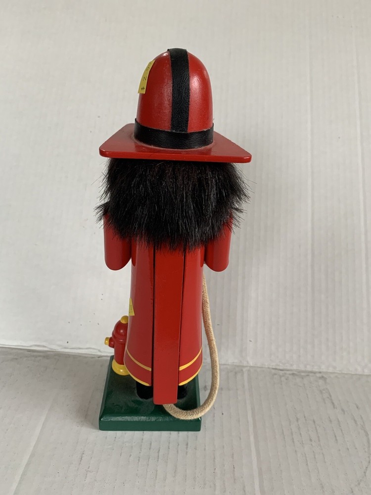 Wooden Fireman with Firehose & Fire Hydrant Nutcracker 10 In Tall