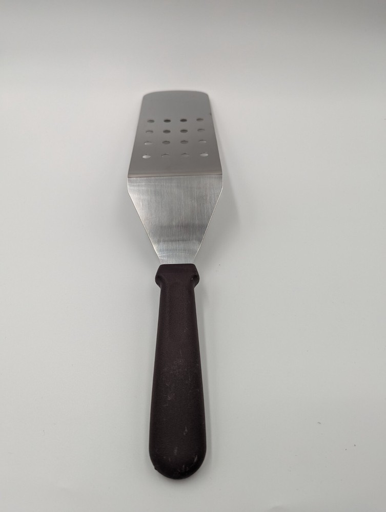 Update International 10" x 3" Perforated Turner w/ Plastic Handle