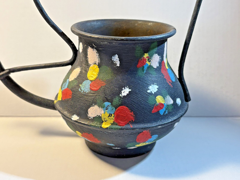 Hand painted decorative copper watering can. 8" tall. Light rust inside.