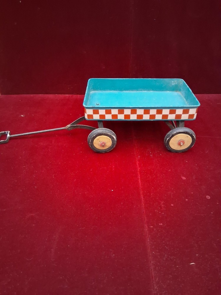 antique tin pull behind kids display cart